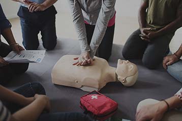 Group of people taking a CPR class